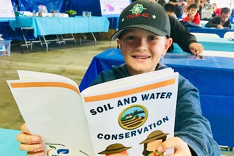 A California student learns about soil and water conservation.