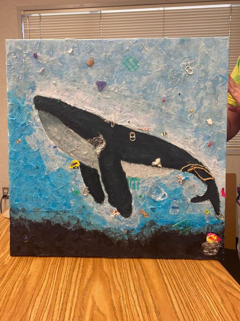 Capstone art project focusing on the impact of ocean pollution on marine mammals.